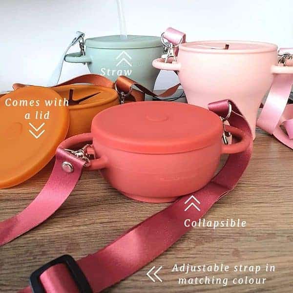 A set of colorful bowls with straps attached to them.