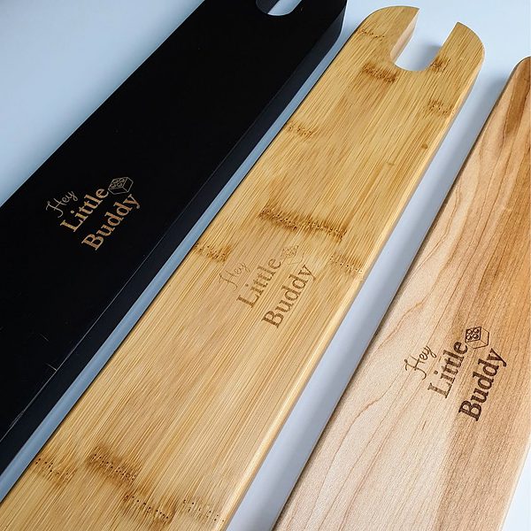 Three wooden spoons with the name of the little buggy on them, Footrest for Ikea Antilop Baby Highchair - Bamboo, Maple, & Bamboo in Black.