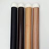 Four wooden broomsticks with white and black tips. Four wooden broomsticks with white and black tips.
